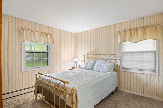 5 Seward Ln, Stony Brook, NY 11790 - bedroom featuring wallpapered walls, a baseboard heating unit, and carpet
