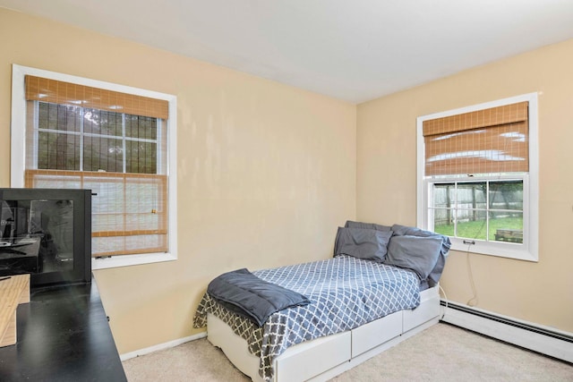 5 Seward Ln, Stony Brook, NY 11790 - bedroom with baseboard heating and carpet floors