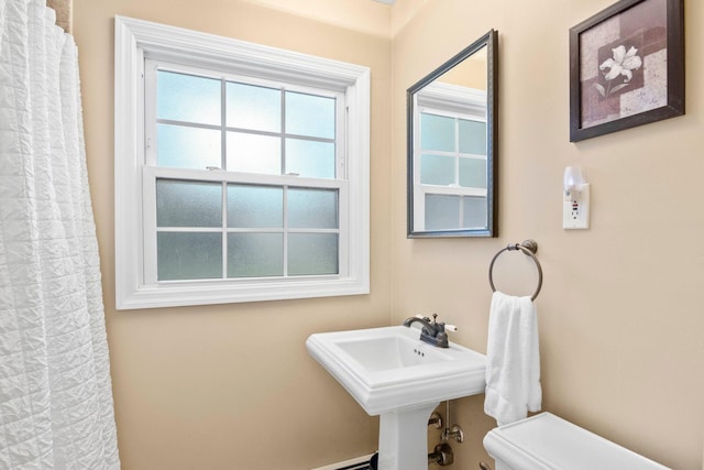 5 Seward Ln, Stony Brook, NY 11790 - bathroom featuring toilet and a shower with curtain