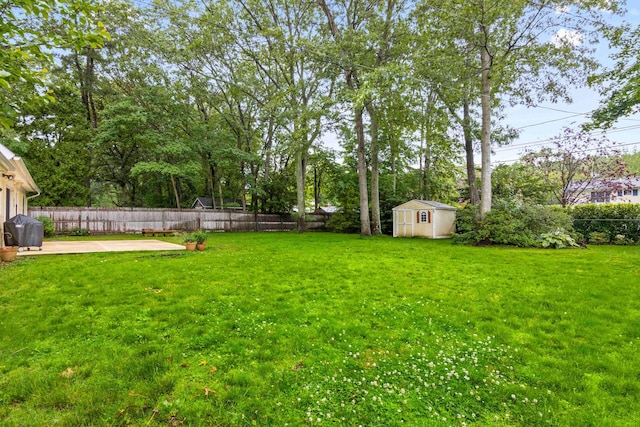 5 Seward Ln, Stony Brook, NY 11790 - fenced backyard featuring a shed and a patio area
