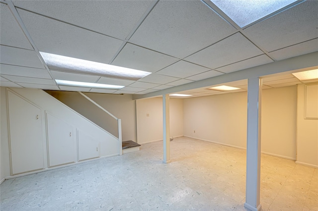 26 Village Ln, Hauppauge, NY 11788 - finished basement featuring stairs, a paneled ceiling, and light floors