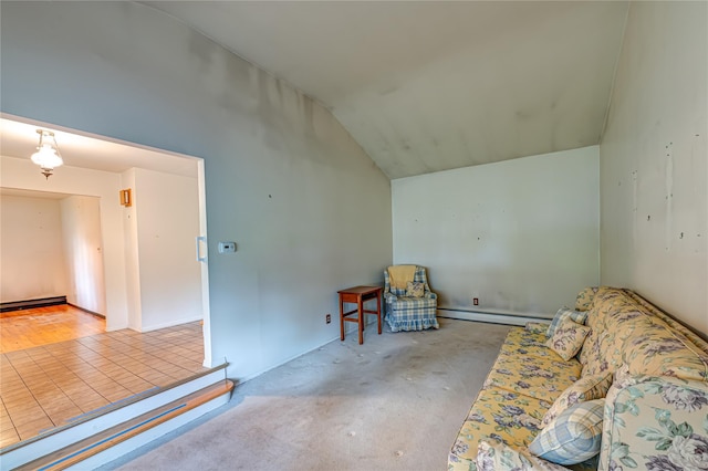 26 Village Ln, Hauppauge, NY 11788 - living area featuring baseboard heating, lofted ceiling, and a baseboard radiator