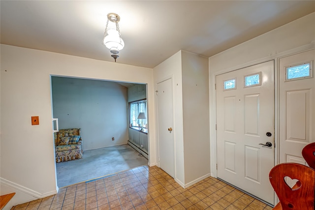26 Village Ln, Hauppauge, NY 11788 - foyer with baseboards and light colored carpet