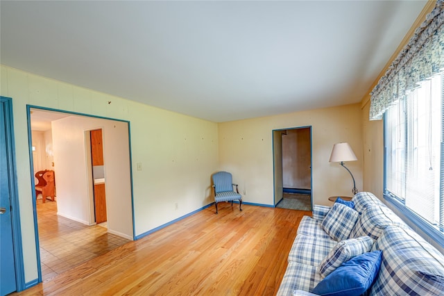 26 Village Ln, Hauppauge, NY 11788 - sitting room with light wood-style flooring and baseboards