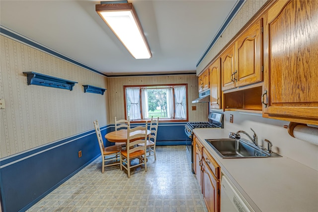 26 Village Ln, Hauppauge, NY 11788 - kitchen with stainless steel range with gas stovetop, light countertops, brown cabinetry, under cabinet range hood, and crown molding