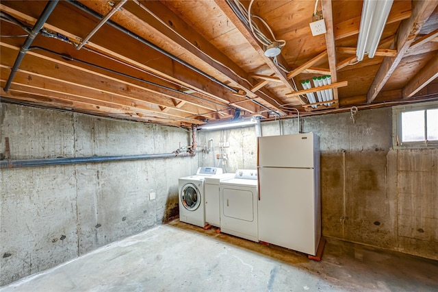 26 Village Ln, Hauppauge, NY 11788 - basement with freestanding refrigerator and washer and dryer