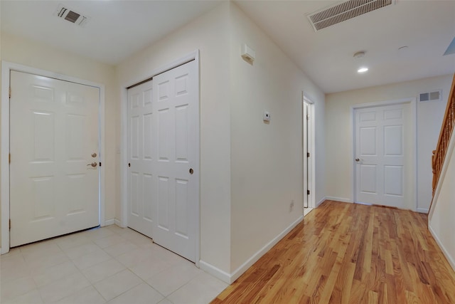 32 Janet Ln, Breezy Point, NY 11697 - entrance foyer featuring recessed lighting and light wood finished floors