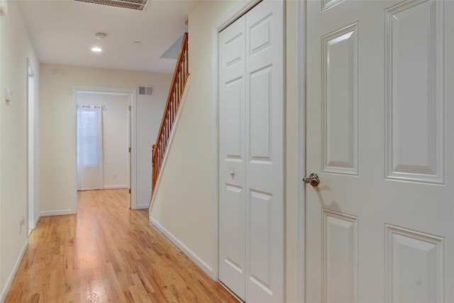 32 Janet Ln, Breezy Point, NY 11697 - hall featuring light wood-style floors, stairs, and recessed lighting