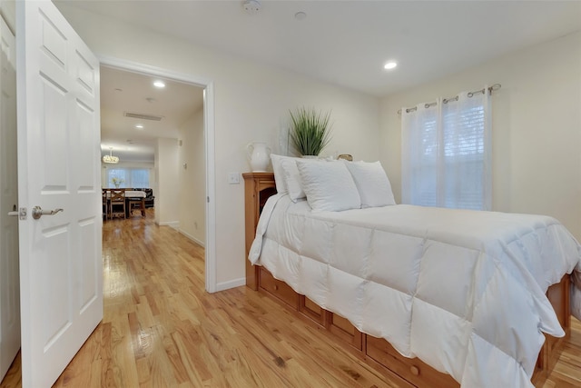 32 Janet Ln, Breezy Point, NY 11697 - bedroom with light wood-style floors and recessed lighting