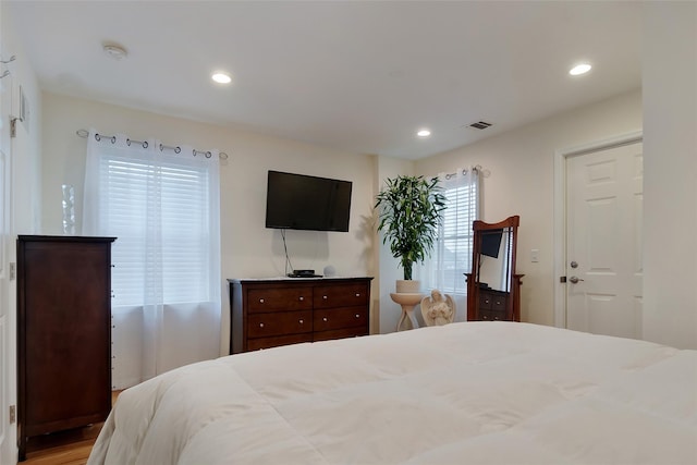 32 Janet Ln, Breezy Point, NY 11697 - bedroom featuring recessed lighting and wood finished floors