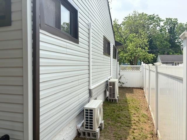 747 Janos Ln, West Hempstead, NY 11552 - view of property exterior with an ac unit