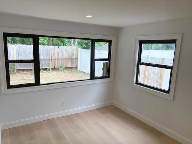 747 Janos Ln, West Hempstead, NY 11552 - spare room featuring healthy amount of natural light, light wood finished floors, and recessed lighting