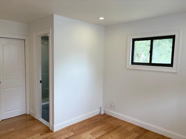 747 Janos Ln, West Hempstead, NY 11552 - spare room with light wood finished floors and recessed lighting
