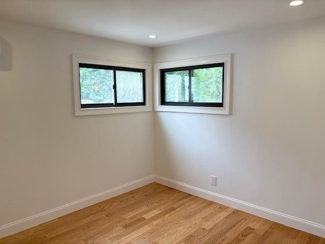 747 Janos Ln, West Hempstead, NY 11552 - spare room featuring healthy amount of natural light, light wood finished floors, and recessed lighting