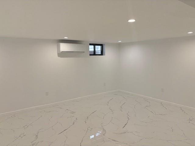 747 Janos Ln, West Hempstead, NY 11552 - below grade area featuring marble finish flooring, recessed lighting, and a wall unit AC