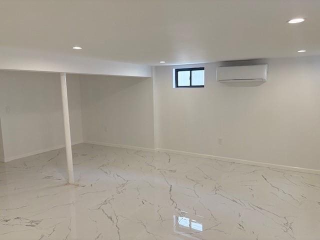 747 Janos Ln, West Hempstead, NY 11552 - basement featuring an AC wall unit, recessed lighting, and marble finish flooring