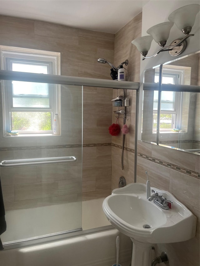 66-92 Selfridge St Unit 3J, Forest Hills, NY 11375 - bathroom with shower / bath combination with glass door and tile walls