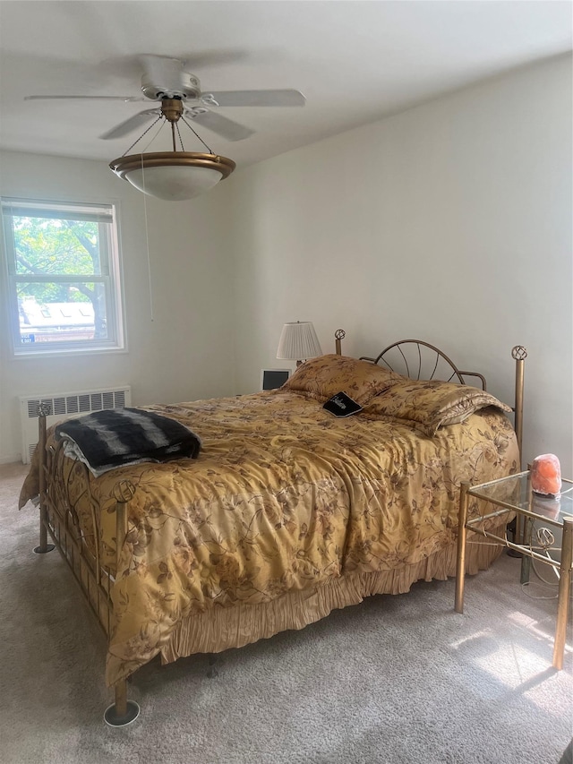 66-92 Selfridge St Unit 3J, Forest Hills, NY 11375 - carpeted bedroom featuring radiator heating unit and a ceiling fan