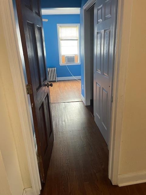 60 Hartsdale Rd, Elmsford, NY 10523 - hallway with radiator and dark wood-style flooring