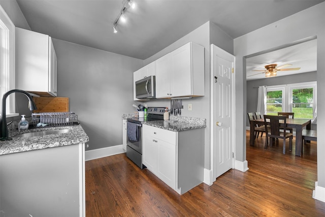 2031 Rte 302, Circleville, NY 10919 - kitchen with appliances with stainless steel finishes, light stone counters, and dark wood-style flooring