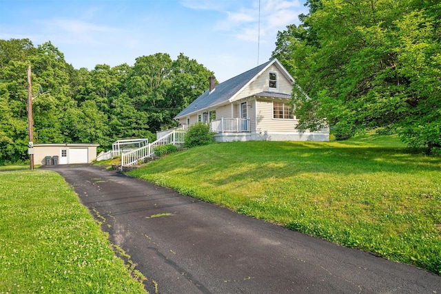 2031 Rte 302, Circleville, NY 10919 - view of front of property with an outbuilding, a chimney, a garage, and a front lawn
