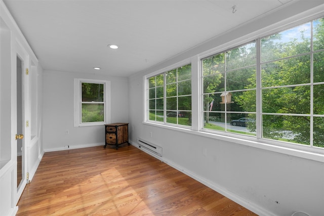2031 Rte 302, Circleville, NY 10919 - unfurnished sunroom featuring a baseboard heating unit and plenty of natural light