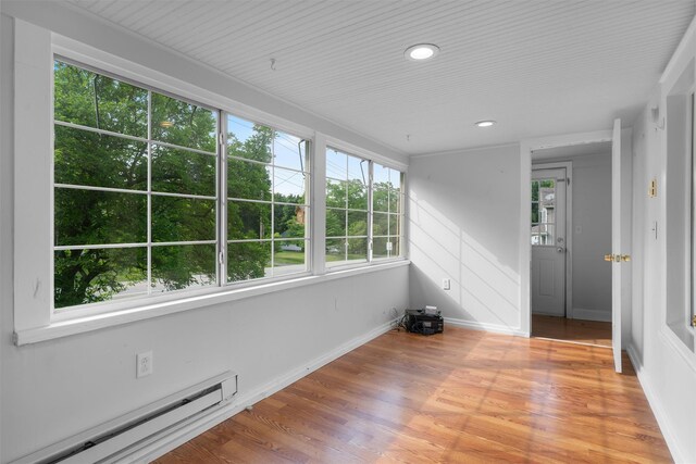 2031 Rte 302, Circleville, NY 10919 - unfurnished sunroom featuring a baseboard radiator