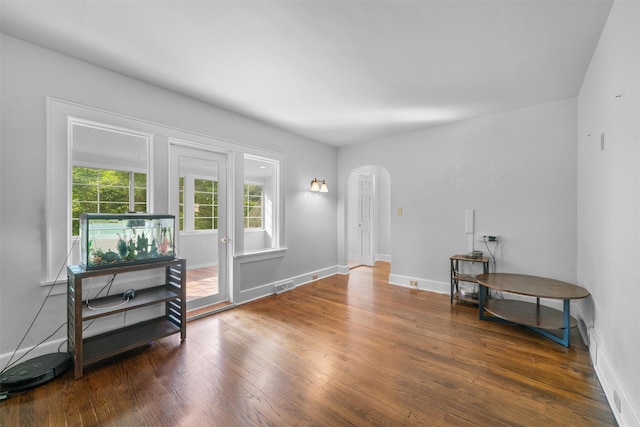 2031 Rte 302, Circleville, NY 10919 - sitting room with arched walkways and wood finished floors