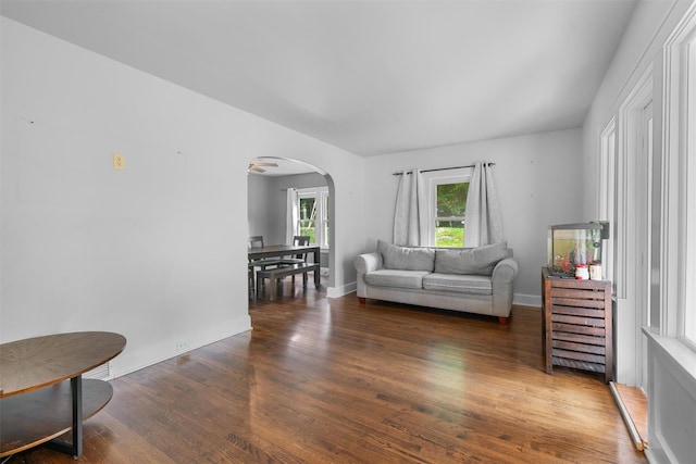 2031 Rte 302, Circleville, NY 10919 - living room with arched walkways and wood finished floors