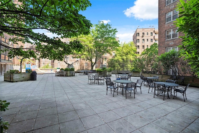 70-20 108th St Unit 5P, Forest Hills, NY 11375 - view of patio featuring outdoor dining area