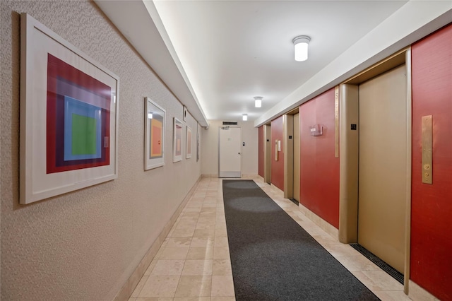 70-20 108th St Unit 5P, Forest Hills, NY 11375 - hall featuring elevator and light tile patterned floors
