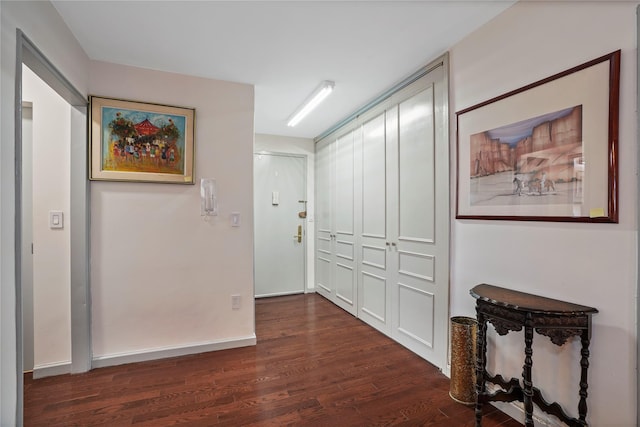 70-20 108th St Unit 5P, Forest Hills, NY 11375 - corridor featuring dark wood finished floors and baseboards