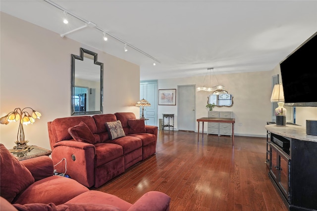70-20 108th St Unit 5P, Forest Hills, NY 11375 - living room featuring dark wood-type flooring and track lighting