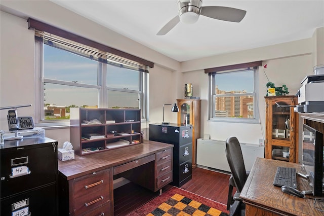 70-20 108th St Unit 5P, Forest Hills, NY 11375 - home office with dark wood finished floors and ceiling fan