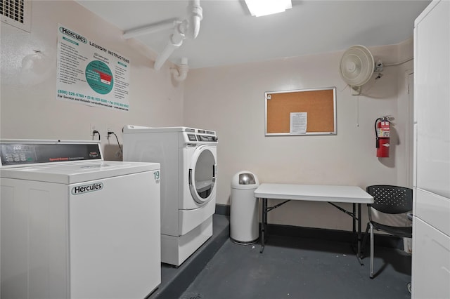 70-20 108th St Unit 5P, Forest Hills, NY 11375 - communal laundry room featuring separate washer and dryer