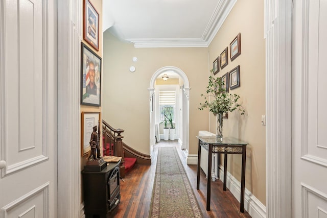 223 Warburton Ave, Yonkers, NY 10701 - hallway featuring dark wood-type flooring, ornamental molding, and arched walkways