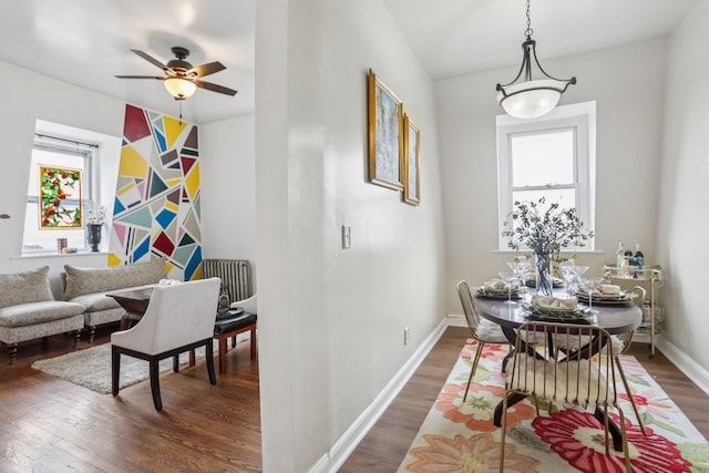 223 Warburton Ave, Yonkers, NY 10701 - dining room featuring dark wood-style floors and a ceiling fan