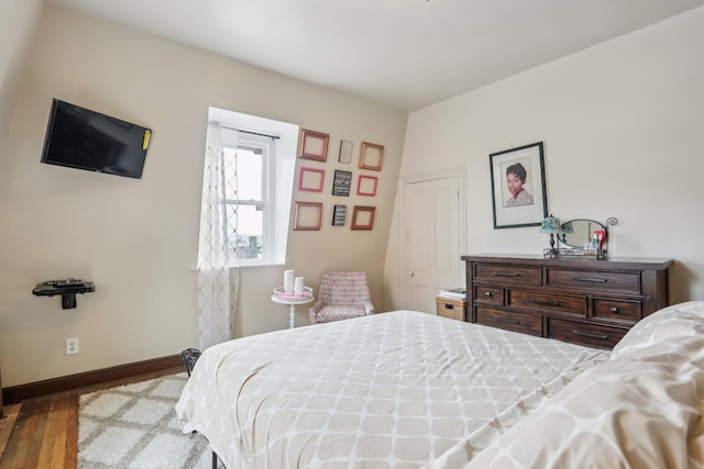 223 Warburton Ave, Yonkers, NY 10701 - bedroom with wood finished floors and baseboards