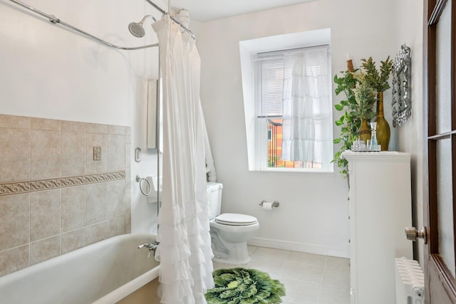 223 Warburton Ave, Yonkers, NY 10701 - bathroom with radiator heating unit, healthy amount of natural light, tile patterned floors, and shower / bath combo with shower curtain