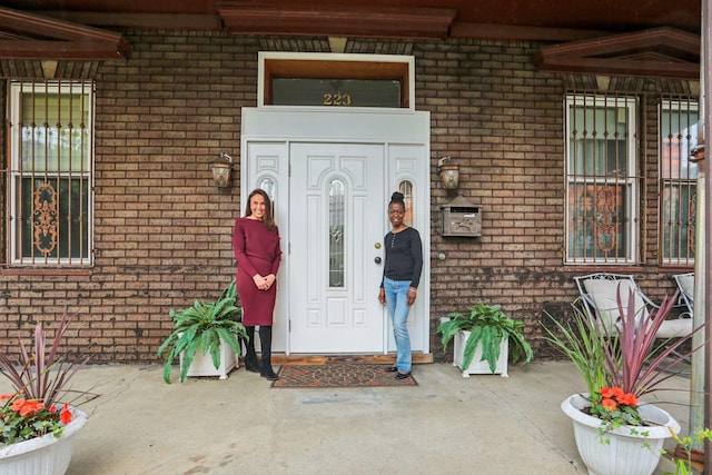 223 Warburton Ave, Yonkers, NY 10701 - entrance to property featuring brick siding