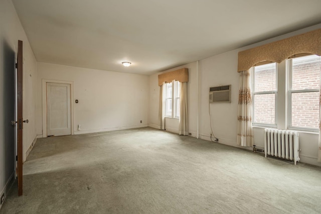 40-29 201st St Unit A, B, C, Bayside, NY 11361 - unfurnished room with radiator, carpet flooring, and a wall mounted air conditioner
