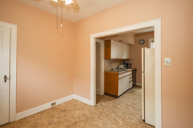 40-29 201st St Unit A, B, C, Bayside, NY 11361 - kitchen featuring stainless steel appliances, ceiling fan, decorative backsplash, light countertops, and light carpet