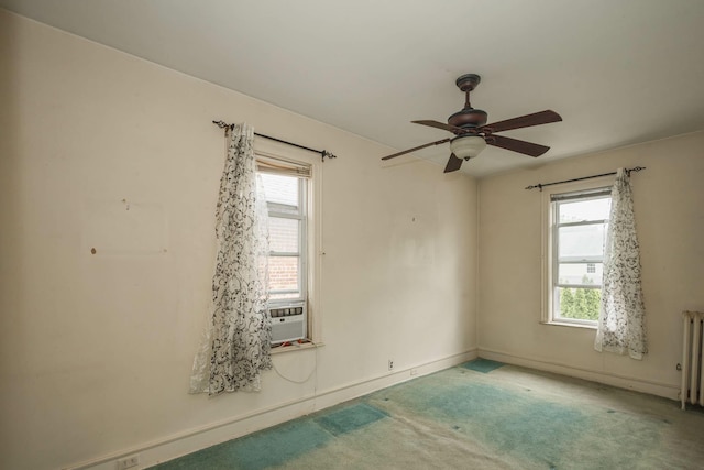 40-29 201st St Unit A, B, C, Bayside, NY 11361 - empty room featuring plenty of natural light, radiator heating unit, carpet flooring, and ceiling fan