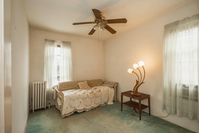 40-29 201st St Unit A, B, C, Bayside, NY 11361 - bedroom with radiator heating unit, carpet floors, and ceiling fan