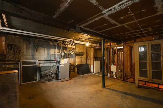 40-29 201st St Unit A, B, C, Bayside, NY 11361 - unfinished below grade area featuring washer / clothes dryer and a heating unit