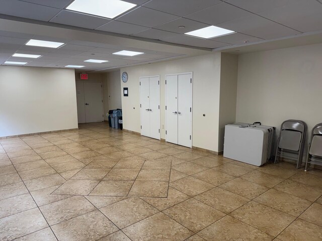 837 Washington Ave Unit 3A, Bronx, NY 10451 - spare room featuring a drop ceiling and baseboards