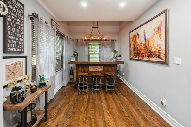 35 Irenhyl Ave, Port Chester, NY 10573 - dining area featuring a bar, wood finished floors, and recessed lighting