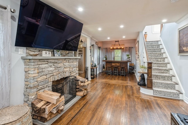 35 Irenhyl Ave, Port Chester, NY 10573 - living room with stairs, hardwood / wood-style floors, a dry bar, recessed lighting, and a stone fireplace