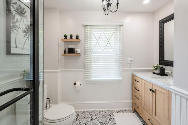 35 Irenhyl Ave, Port Chester, NY 10573 - full bath with wainscoting, vanity, and tile patterned floors