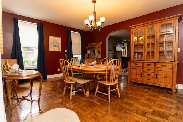3344 Giles Pl, Bronx, NY 10463 - dining space featuring arched walkways and a chandelier